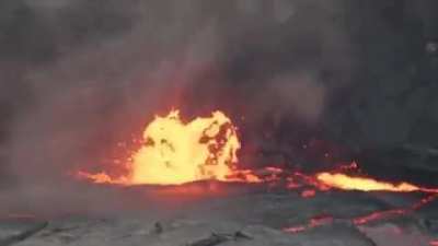 Throwing a drum of water into a lava lake