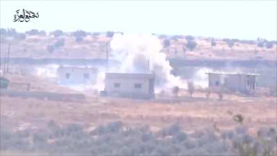 Opposition BGM-71 TOW team hits an SAA tank attempting to reverse back into cover - N. Hama - 10/7/2015