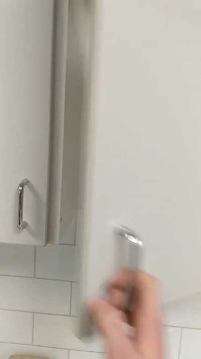 This cupboard at my work. I guess they just ran out of shelves...