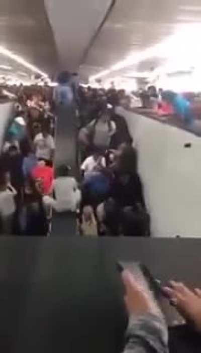 The Pantitl&aacute;n Metro station in Mexico City got so crowded that people started to fall off the escalators when they had no place to fit in