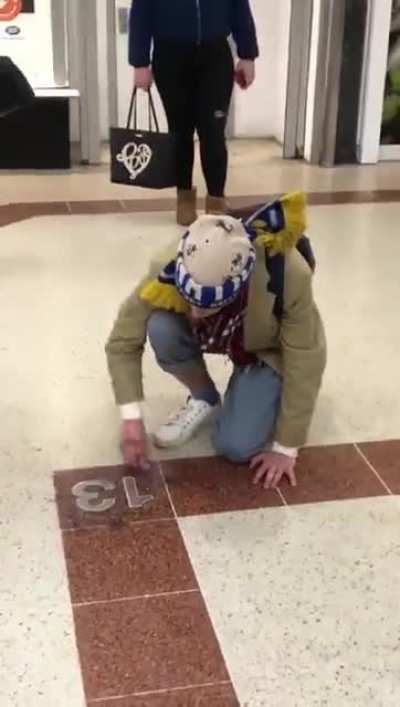 A member of the master race publicly made to clean his graffiti.
