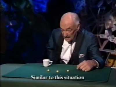 Argentine magician Ren&eacute; Lavand's cup and ball routine