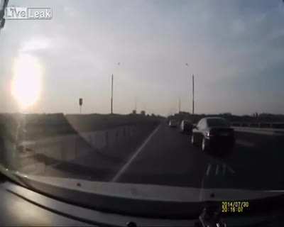 Guy On Motorcycle Crashes But Lands On Car
