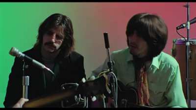 Paul McCartney composes "Get Back" in about 2 minutes out of thin air while waiting for John Lennon.