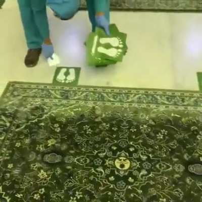 Removing the social distancing stickers at masjid al haram, Makkah following the complete opening tomorrow. Alhamdulillah