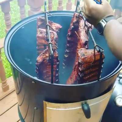 These are the ribs I smoked on Father's Day on my Weber Smokey Mountain "22. First time trying the hanging method.