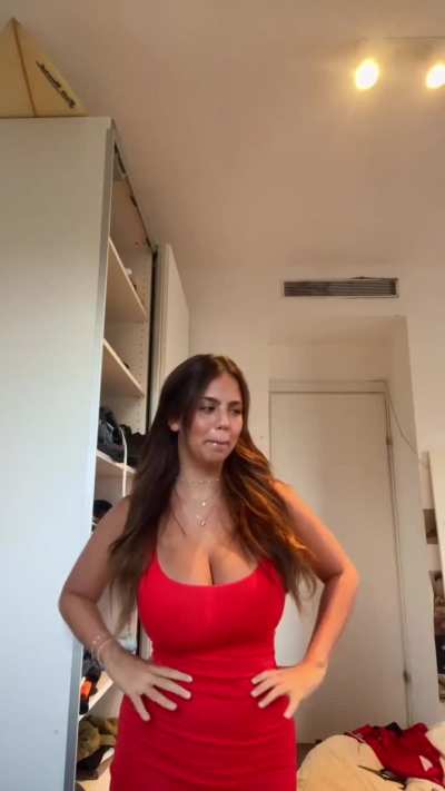 Dana Nufussi in red