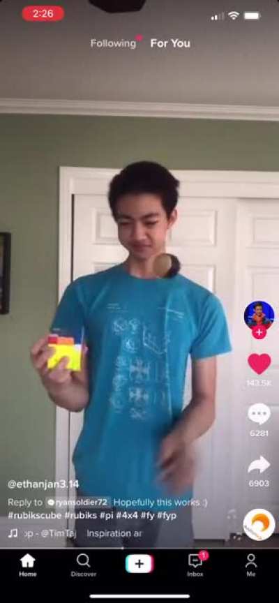 Solving a 4x4 Rubik&rsquo;s cube with one hand while juggling with the other AND reciting 500 digits of pi in 2.5 minutes!