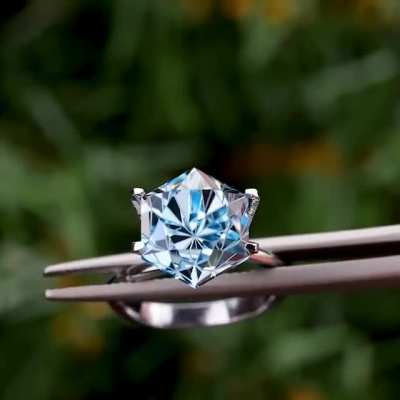 I cut this Brazilian topaz gem myself. Shown in a temporary ring setting.