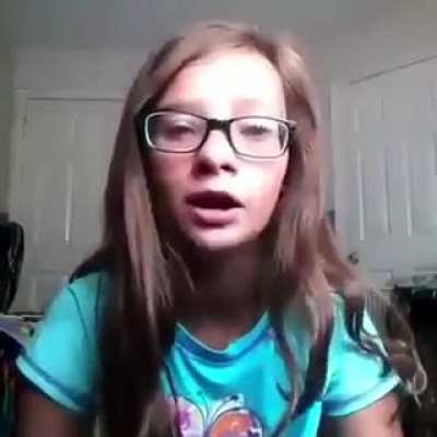 ~12 year old thinks she is a gangster. Caption of the video was 