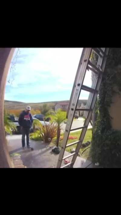 Walking up a ladder whilst holding another one with one hand