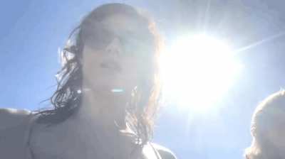 Alexandra Daddario bouncing on the beach