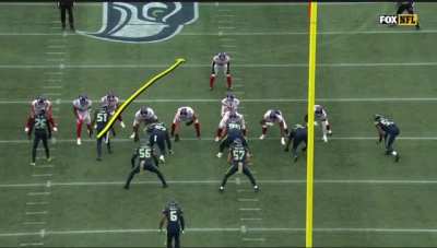 Bruce Irvin tackles Saquon Barkley using Daniel Jones