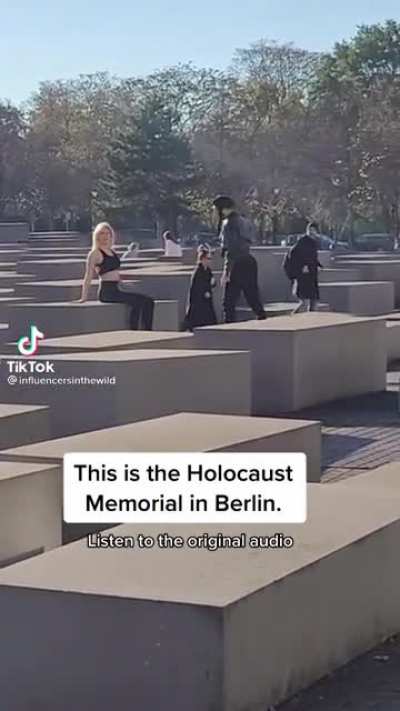 Posing as a model on the Holocaust memorial