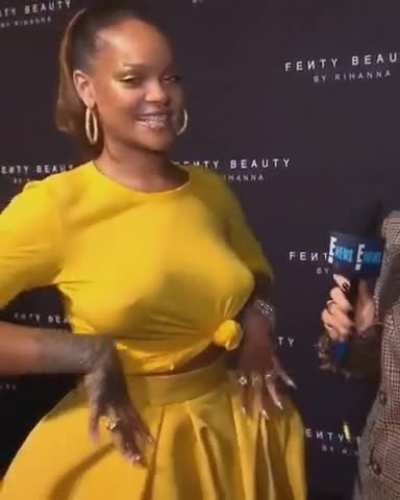Rihanna's big braless tits