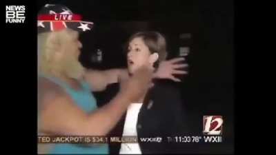 Kissing reporters live.