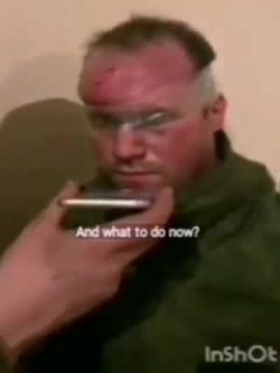 Ukrainian soldiers let Russian captive soldier to call his parents.