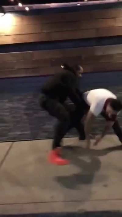 Context: Big guy groped the lady's ass.