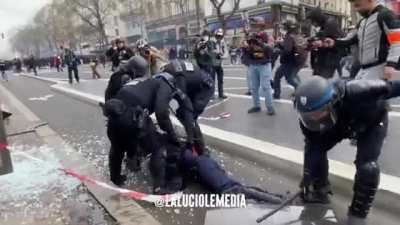 French Riot police officer knocked out by a projectile