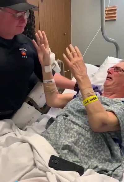 During the pandemic, this 73-yr old dad was in a bad car accident, and hospitalized. When it was time to go to rehab, the hospital arranged for his son - a paramedic in another city &mdash; to be the one to transport him. Here&rsquo;s when they saw one another.