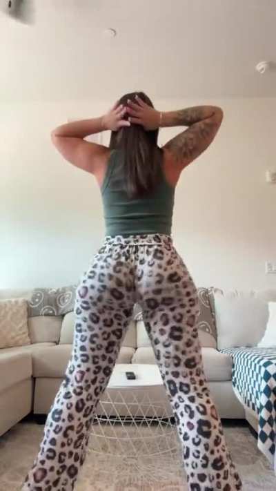 Hands behind her head 