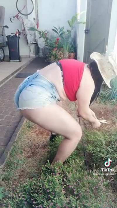 Gardening with a sexy outfit
