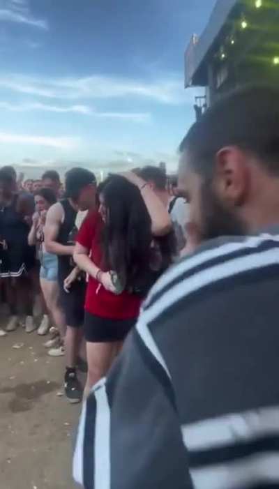 Man jumps headfirst from stage into audience and they don't catch him.
