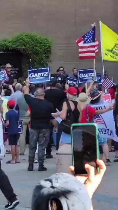 Crowd of protesters chanting &ldquo;pedophile&rdquo; at Matt Gaetz