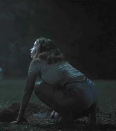 On her knees
