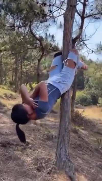 Working-out using a piece of wood impressively.