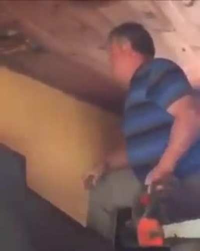 This guy using a chainsaw...