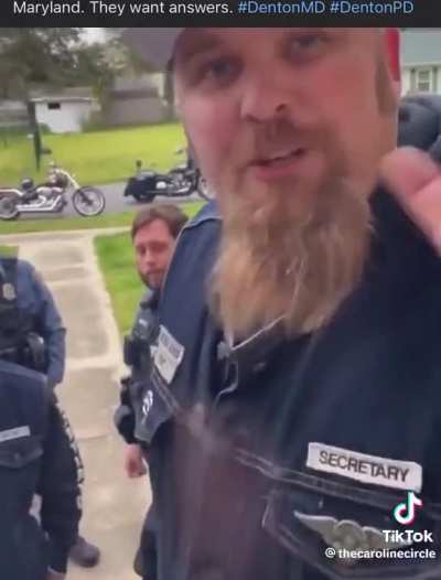 Police officers in Denton, MD stand around while their buddy threatens to assault a family and destroys their property