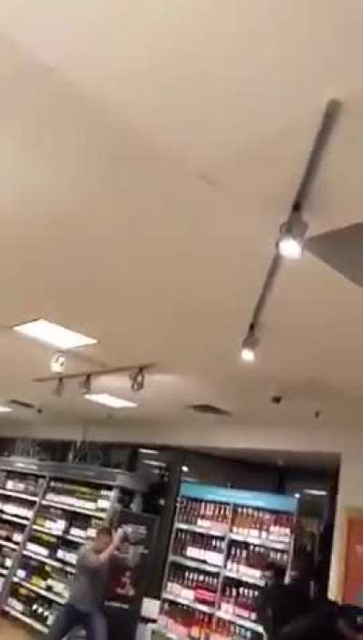 Customer has enough of blatant shoplifting, decides to fight the perps.