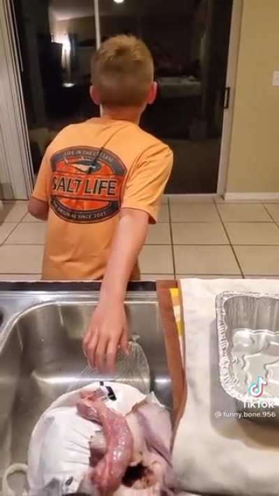 kid thinks Turkey neck is a penis