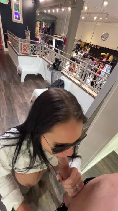 Sucking Dick in fitting room with the curtain open