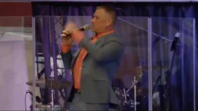 Insane antivaxx televangelist screams at his congregation "do not get vaccinated" and only "crack-smoking, demon-possessed leftists" think Biden is the legitimate president.