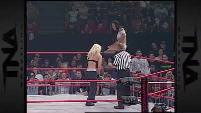 Gail Kim caught crotch first on the ring post