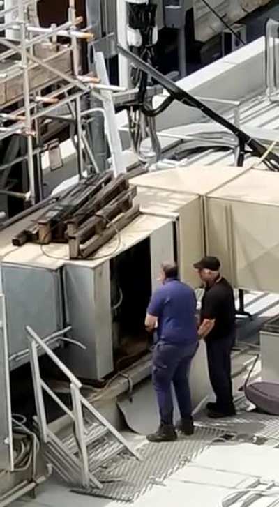 A few days ago I posted about a loud noise coming from a nearby building. Today they sent someone to "fix" it.
