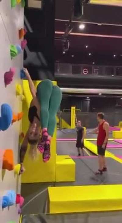 Girl doing flagpole and something else