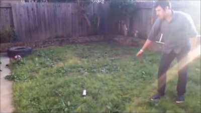Guy throws knife at spray paint can and regrets it immediately.