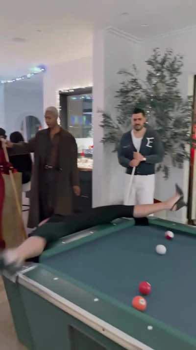 Liza as human pool cue stick