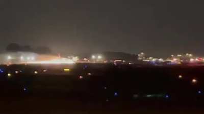 Another view of the FedEx 757 belly landing from the ramp crew.