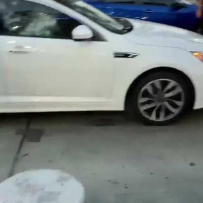 Good samaritans rush in to help an elderly man who was having a seizure inside his car in Garden Grove, California.