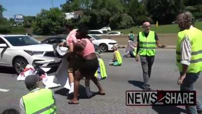 Parolee gets arrested because protesters block the way to his work.