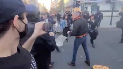 Pro Trump supporter assaults multiple people. Gets knocked out after mob forms.