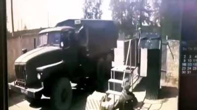 A Russian truck runs over their own soldier.
