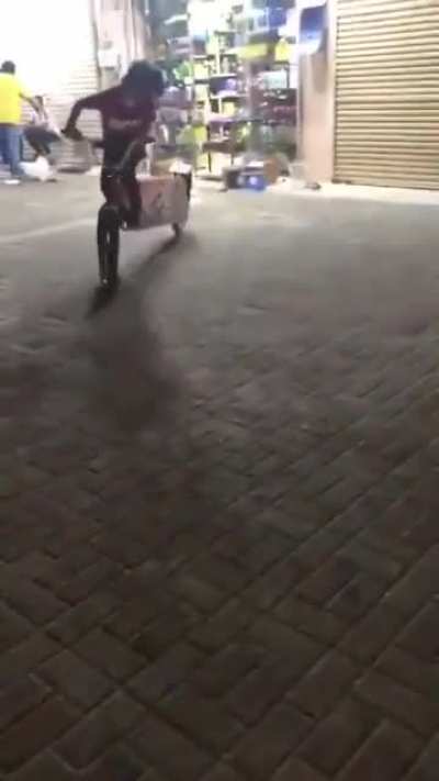 Kid shows off his bike skills