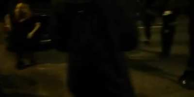 Protestors on highway suprised when car comes