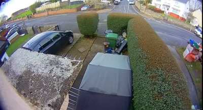 Kid on a speeding electric bike slams into a garden gate head on, and despite the pain, manages to walk himself back home