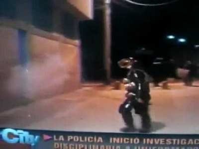 Pushing a cop in full riot gear